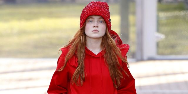 Clothing, Lip, Winter, Sleeve, Red, Textile, People in nature, Headgear, Beanie, Street fashion, 