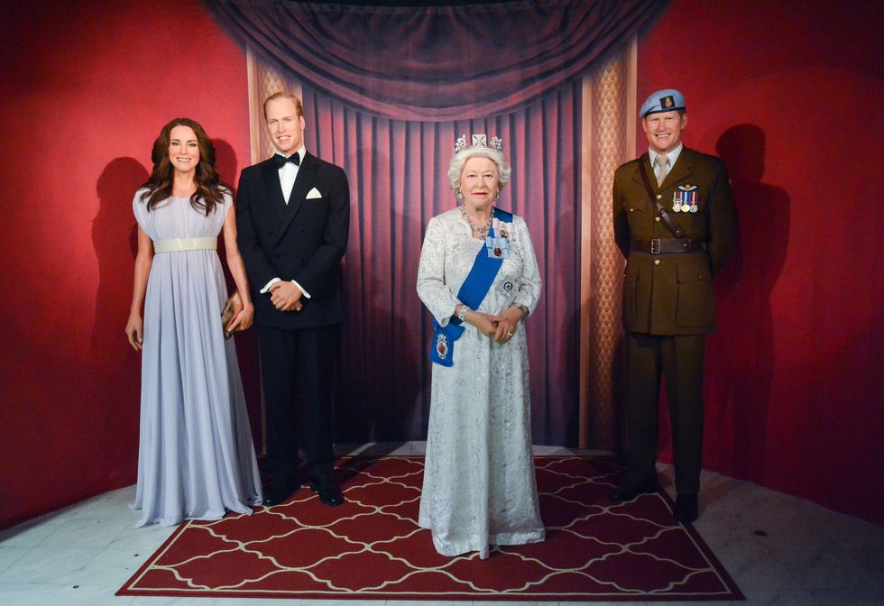 WASHINGTON, DC - MAY 05: Wax figures of Catherine, Duchess of Cambridge, Prince William, Duke of Cambridge, Queen Elizabeth II and Prince Harry are unveiled as The British Royal Family Wax Figures arrive at Madame Tussauds on May 5, 2015 in Washington, DC
