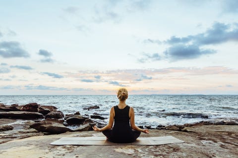 woman meditating woman meditating | ELLE UK