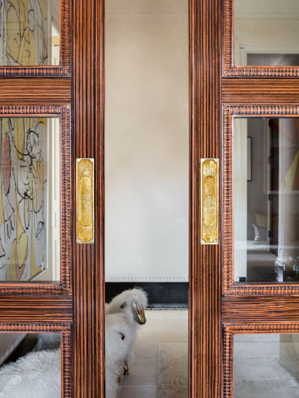 Interior design, Glass, Fixture, Molding, Home door, Door handle, Door, Dog breed, Wood stain, Companion dog, 