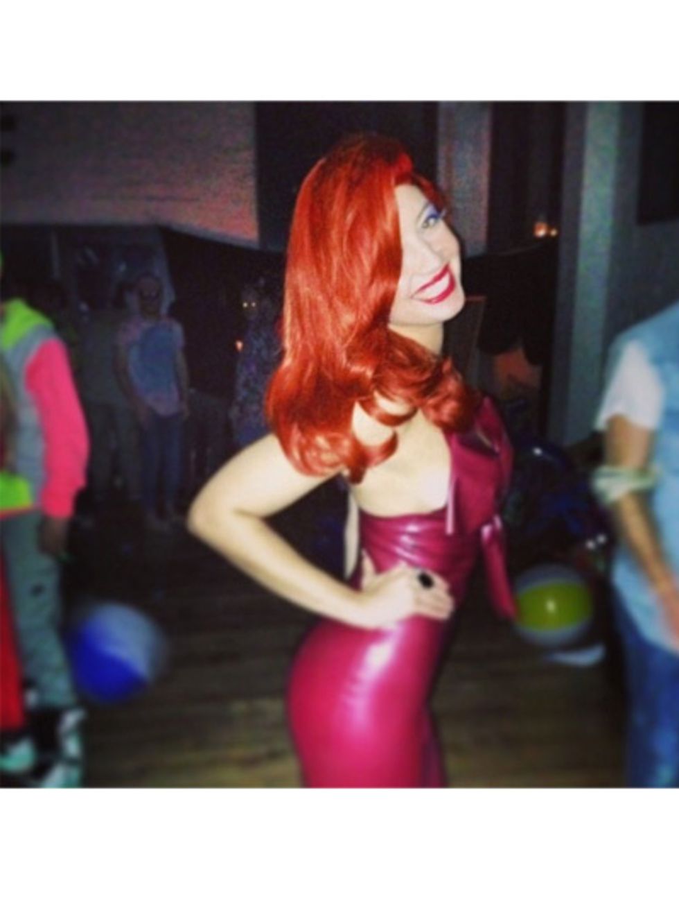 Human body, Latex, Red hair, Magenta, Costume, Fictional character, Waist, Abdomen, Hair coloring, Wig, 