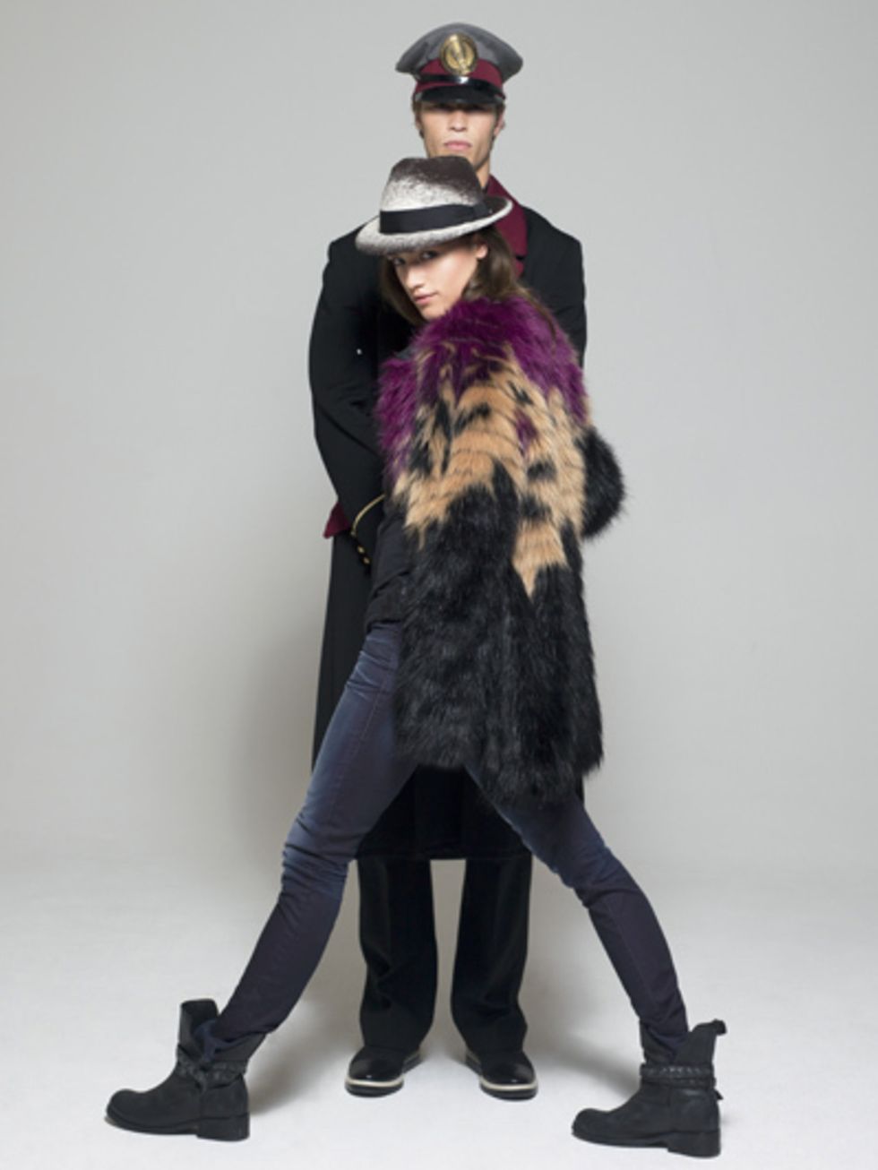 Sleeve, Trousers, Hat, Textile, Coat, Outerwear, Standing, Style, Costume accessory, Headgear, 