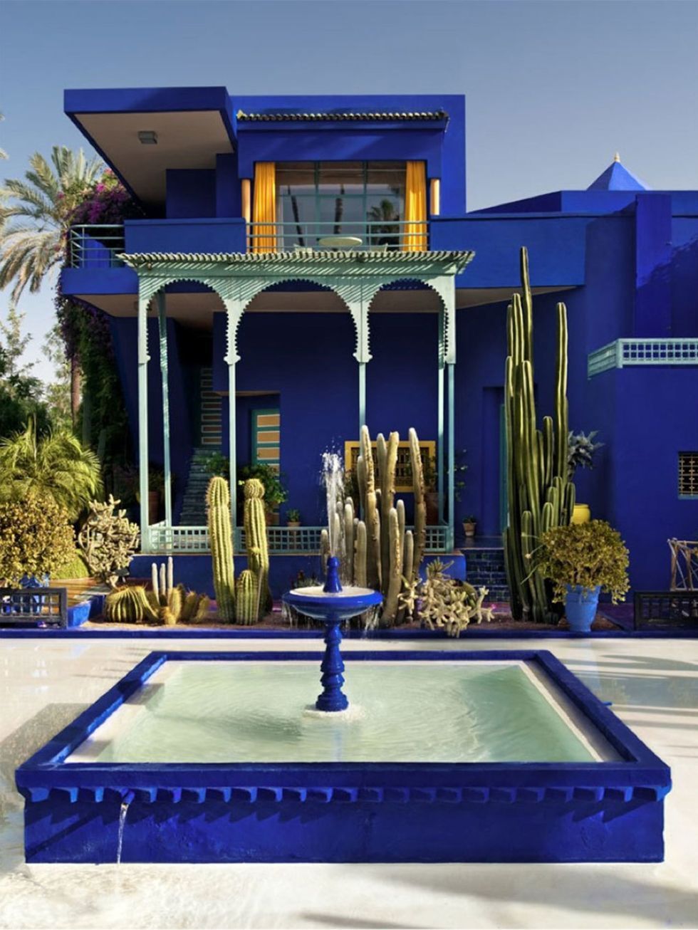 Blue, Majorelle blue, Real estate, Water feature, Azure, House, Column, Fountain, Courtyard, Porch, 