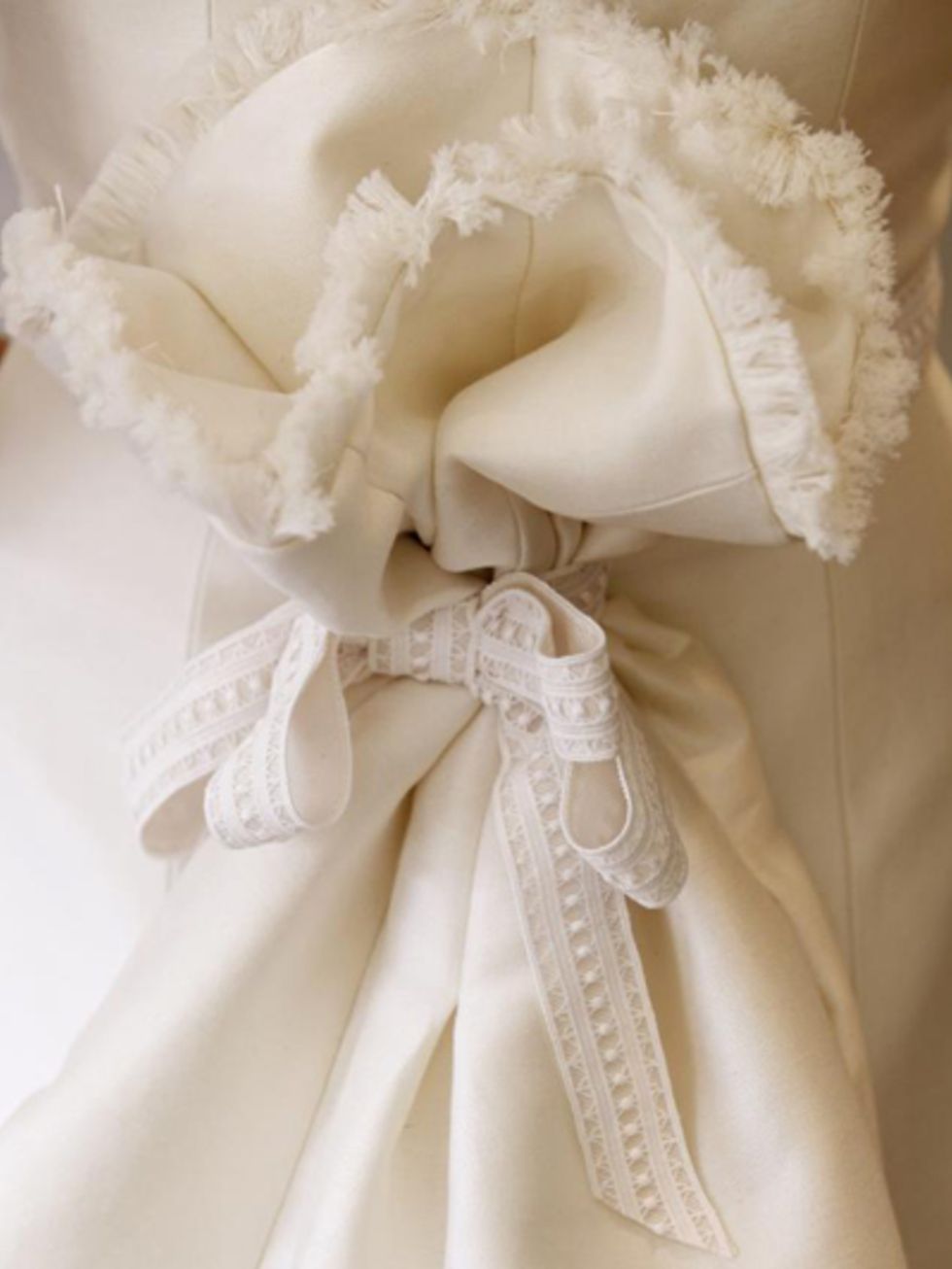 White, Petal, Embellishment, Bridal accessory, Ivory, Beige, Peach, Natural material, Knot, Fashion design, 