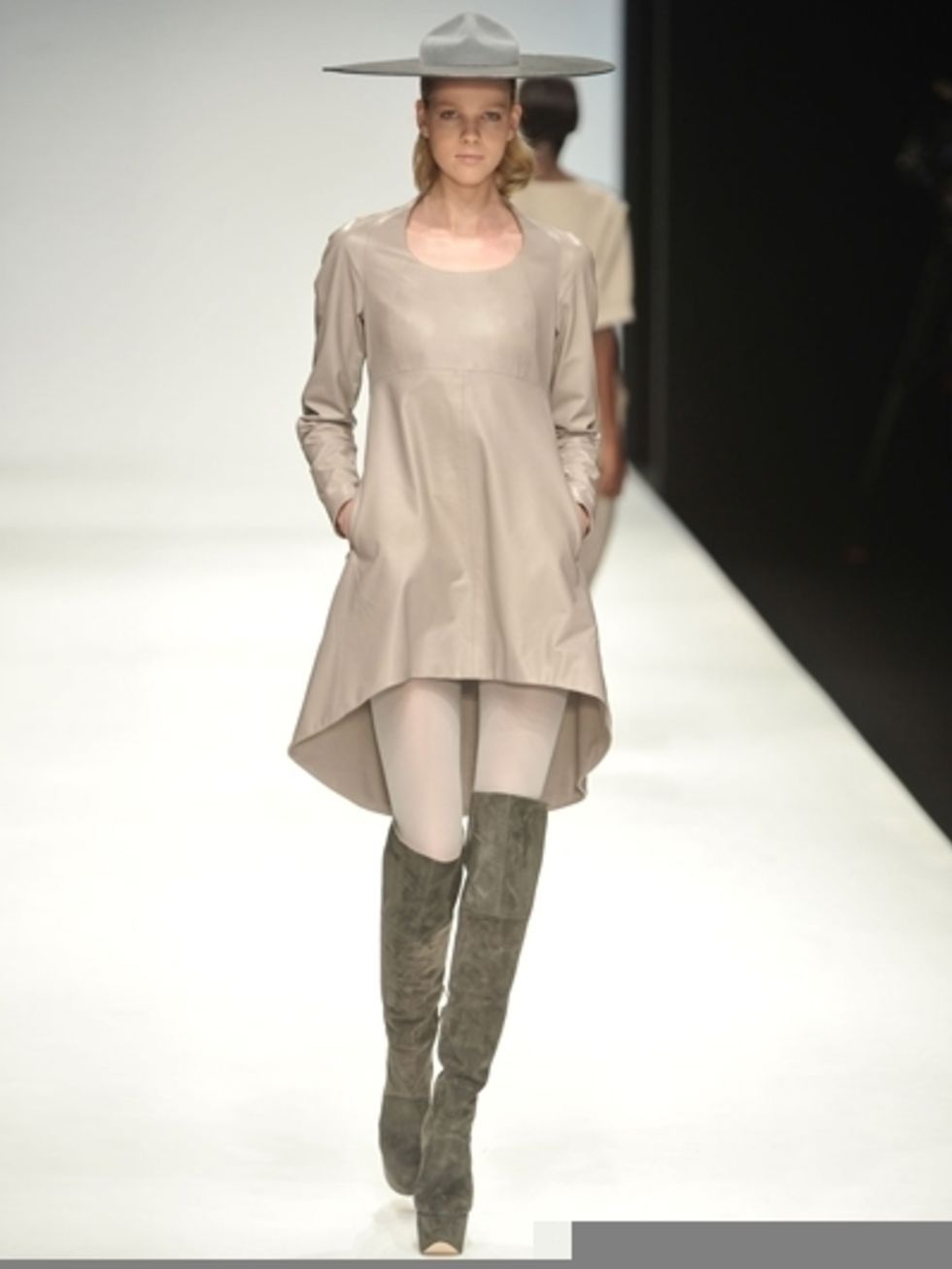 Clothing, Hat, Sleeve, Shoulder, Fashion show, Joint, Shoe, Outerwear, Style, Fashion model, 