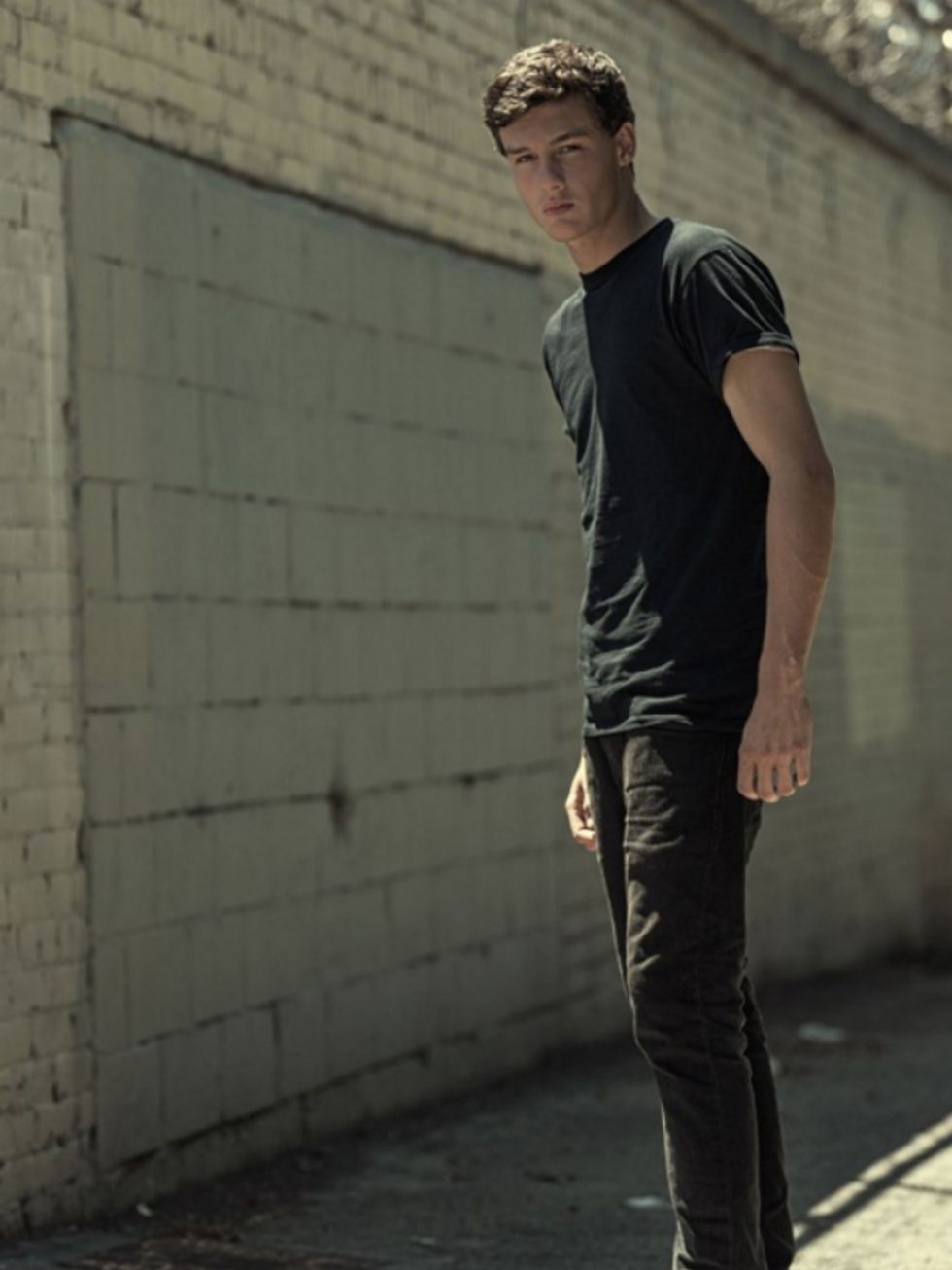 Sleeve, Photograph, Standing, Denim, Elbow, Street fashion, Cap, Cool, Brick, Pocket, 