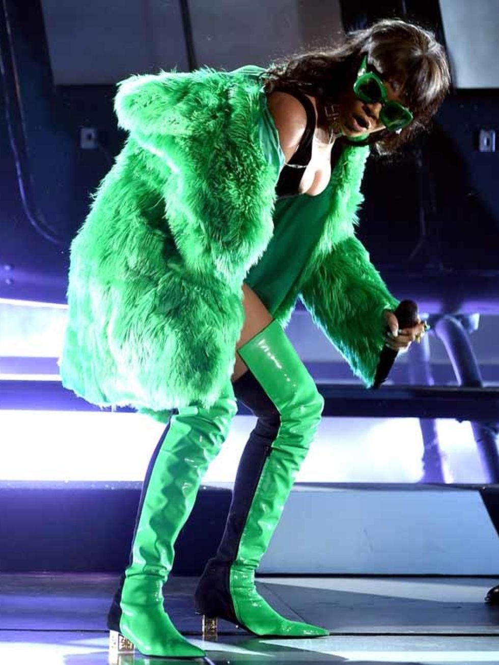 Green, Fur, Stage, Costume, Animal product, Fictional character, Costume design, Acting, 