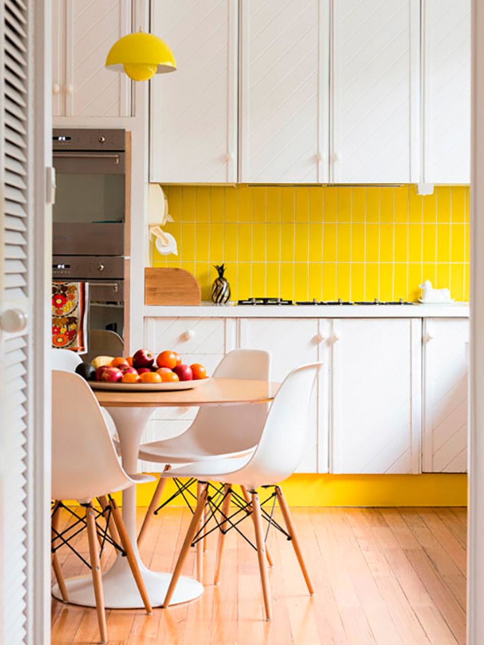 Yellow, Orange, Interior design, Room, Floor, Flooring, Table, Umbrella, Light fixture, Interior design, 