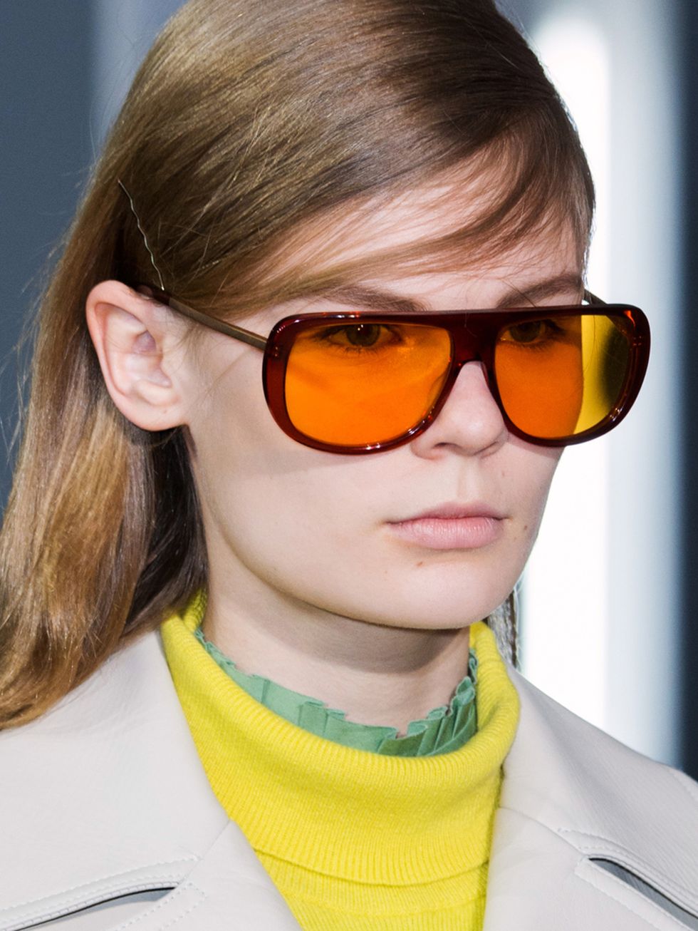 Clothing, Eyewear, Glasses, Ear, Vision care, Goggles, Hairstyle, Yellow, Collar, Chin, 