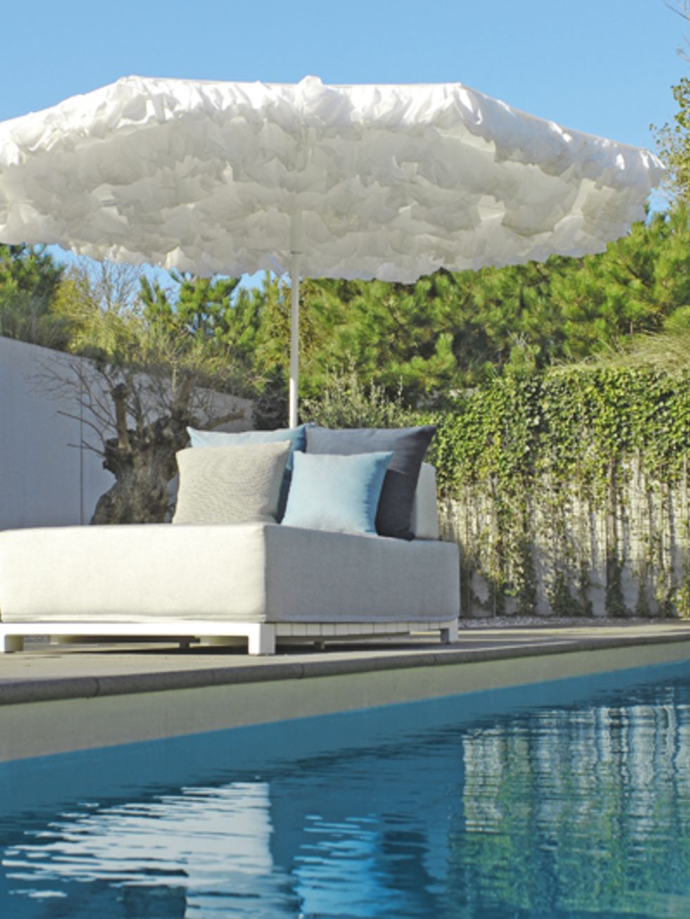 Blue, Swimming pool, Reflection, Aqua, Azure, Shade, Composite material, Resort, Outdoor furniture, Water feature, 
