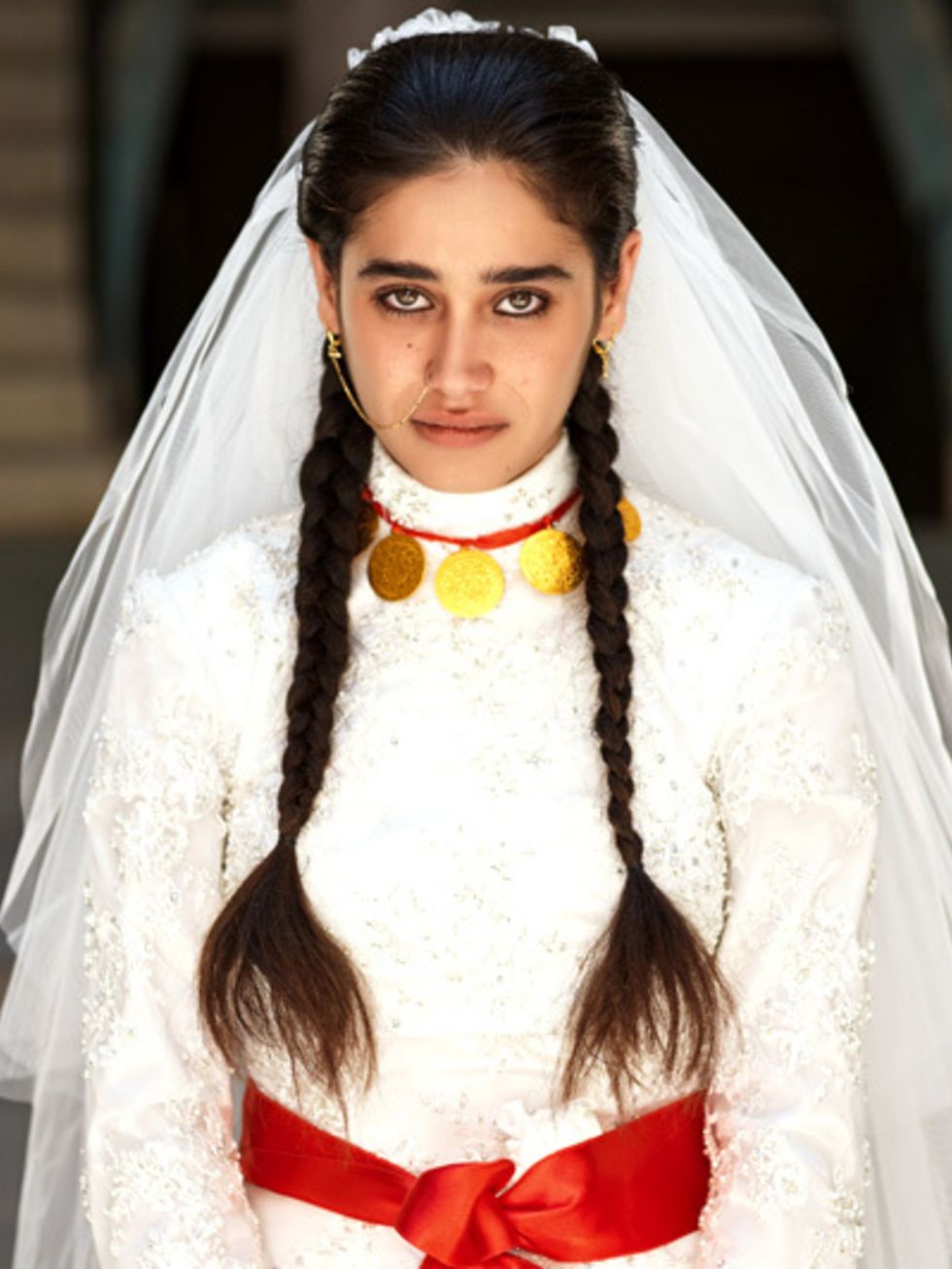 Clothing, Hair, Bridal veil, Veil, Hairstyle, Bridal clothing, Forehead, Eyebrow, Textile, Photograph, 