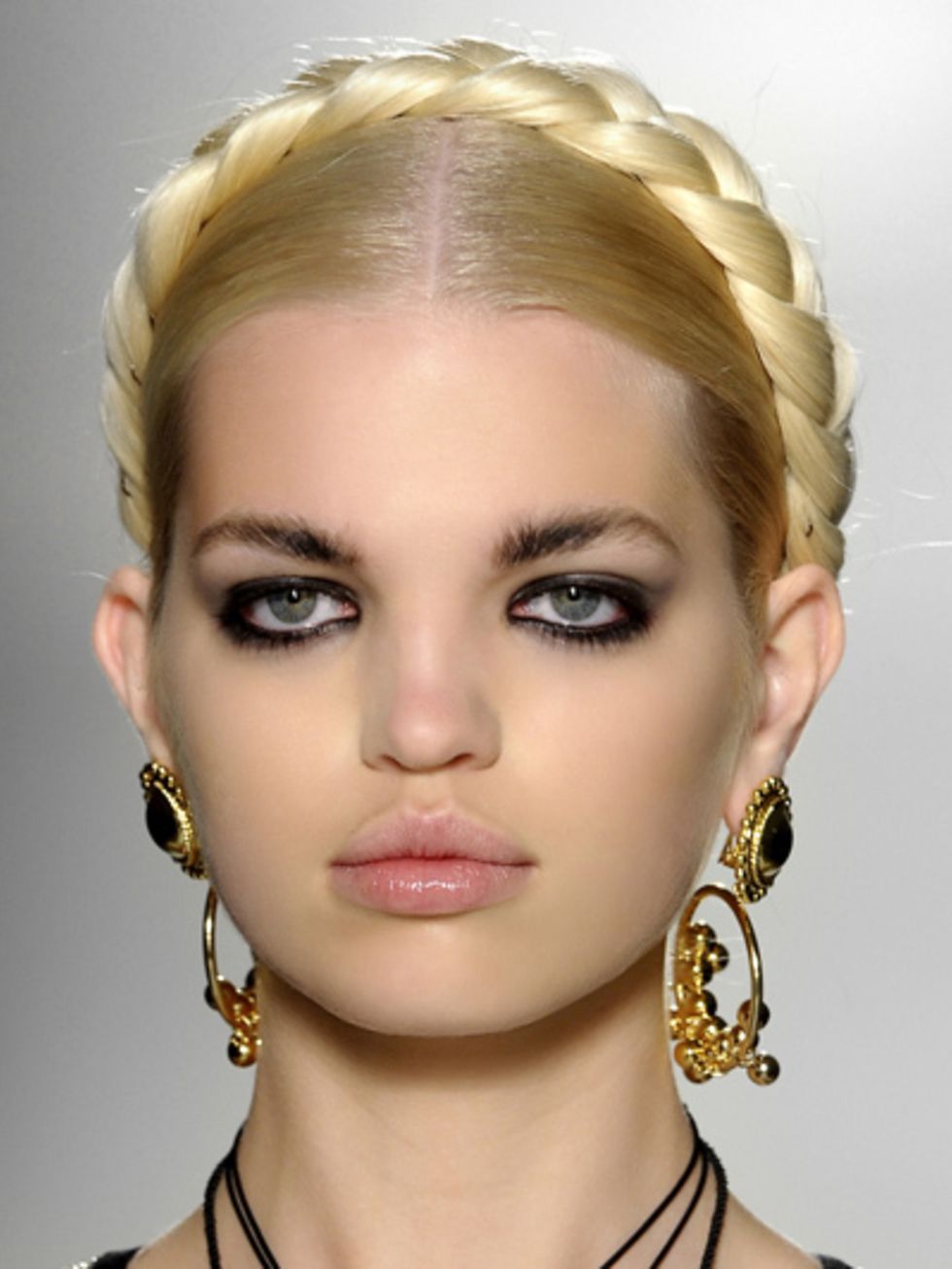 Lip, Hairstyle, Yellow, Skin, Forehead, Eyelash, Eyebrow, Fashion accessory, Earrings, Style, 