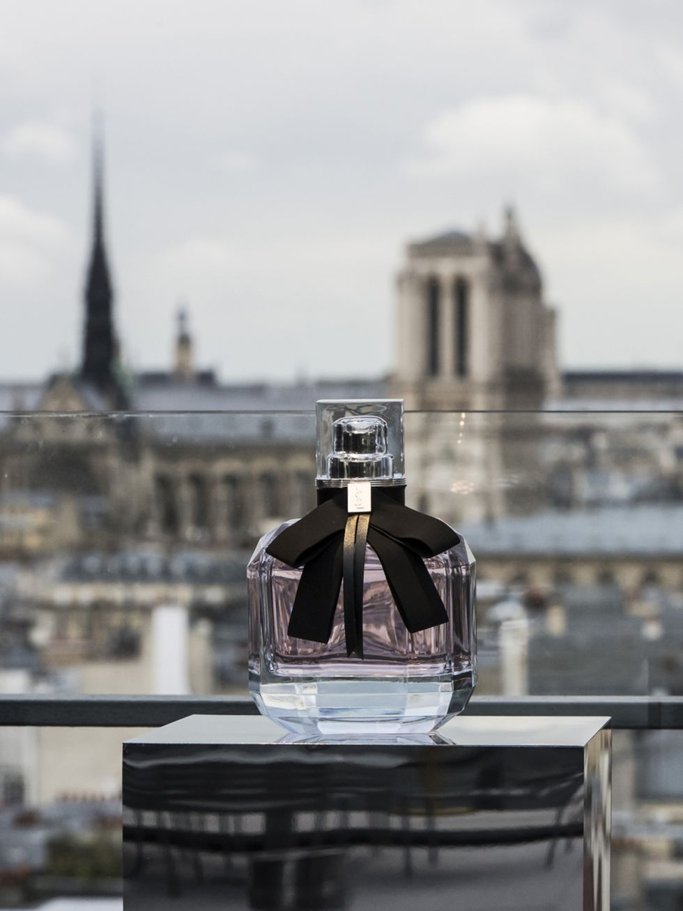 Perfume, Transparent material, Reflection, Still life photography, Spire, Finial, Listed building, Cityscape, 