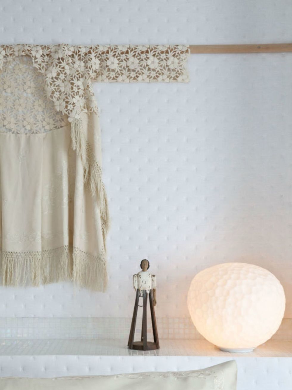 Wall, Interior design, Lighting accessory, Beige, Embellishment, Linens, Still life photography, Lace, Lampshade, Shadow, 