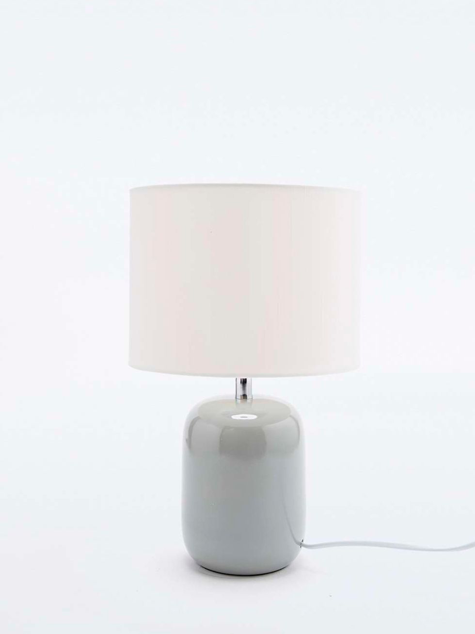 Product, Lighting accessory, Light, Grey, Tints and shades, Lamp, Cylinder, Electricity, Circle, Still life photography, 