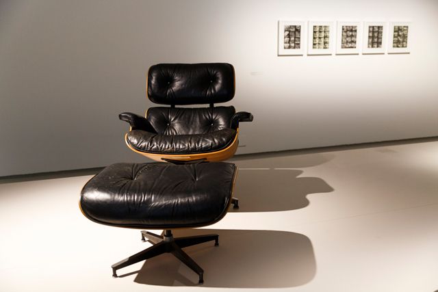 Brown, Chair, Furniture, Floor, Black, Tan, Armrest, Leather, Hardwood, Material property, 