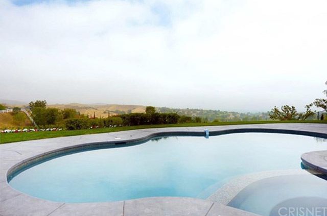 Swimming pool, Property, Real estate, Azure, Concrete, Composite material, Yard, Landscaping, 