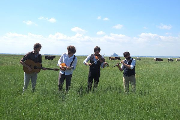 People in nature, Musical instrument, Grassland, Musical instrument accessory, String instrument, Prairie, Musical ensemble, Plucked string instruments, Meadow, Pasture, 