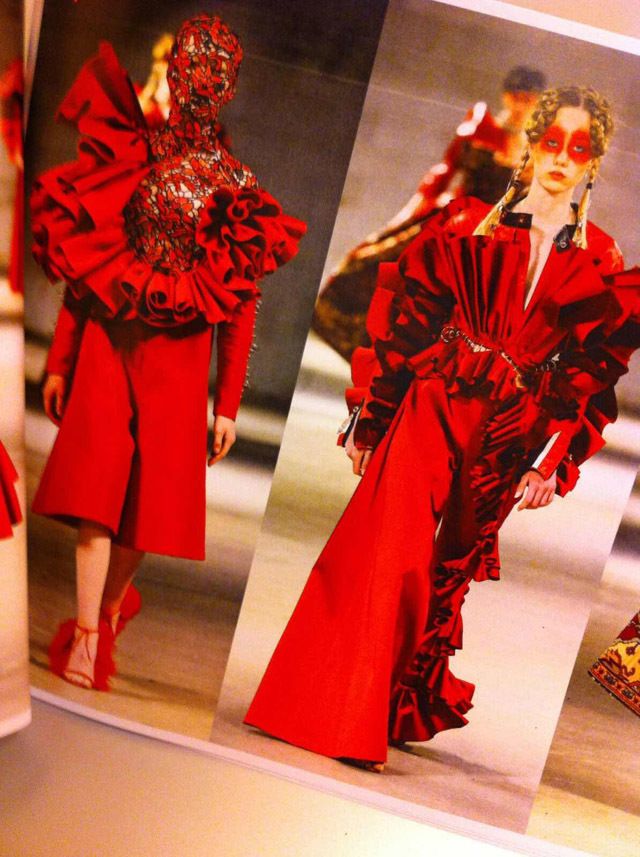 Red, Costume design, Fashion, Carmine, Costume, Costume accessory, Fashion design, Fashion model, Model, One-piece garment, 