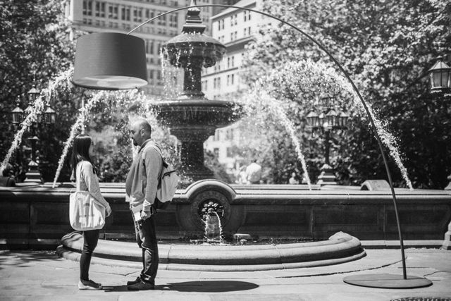 Fountain, Human body, Monochrome, Public space, Jeans, White, Water feature, City, Monochrome photography, Town, 