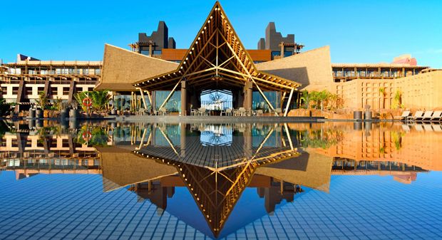Wood, Reflection, Architecture, Real estate, Symmetry, Triangle, Resort, Reflecting pool, Eco hotel, 
