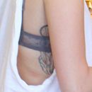 Mileys-vijfde-tatoeage