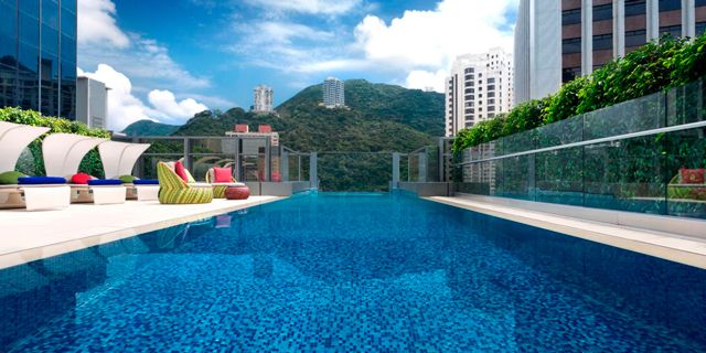 Swimming pool, Property, Real estate, Condominium, Aqua, Tower block, Resort, Apartment, Azure, Metropolitan area, 