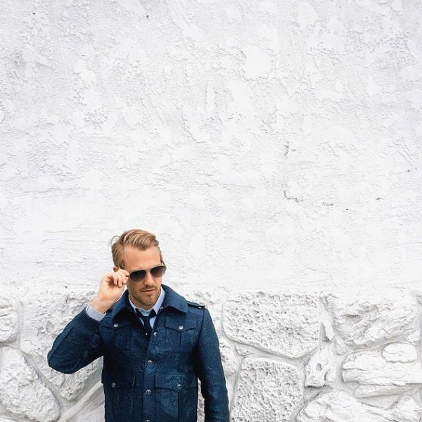 Eyewear, Vision care, Dress shirt, Sleeve, Collar, Shirt, Denim, Wall, Style, Jacket, 