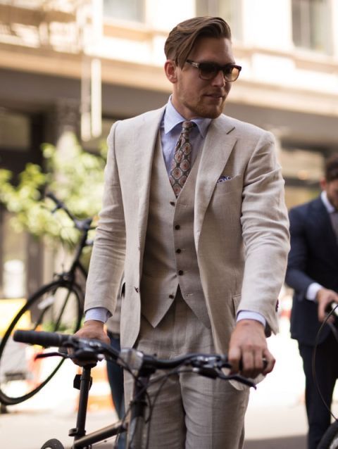 Clothing, Coat, Trousers, Dress shirt, Collar, Shirt, Bicycle frame, Outerwear, Suit, Formal wear, 