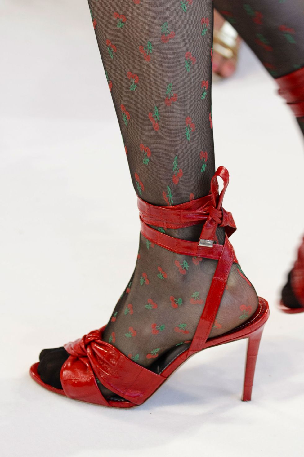 Footwear, Textile, Red, Joint, Human leg, Pattern, Carmine, Fashion, Maroon, High heels, 