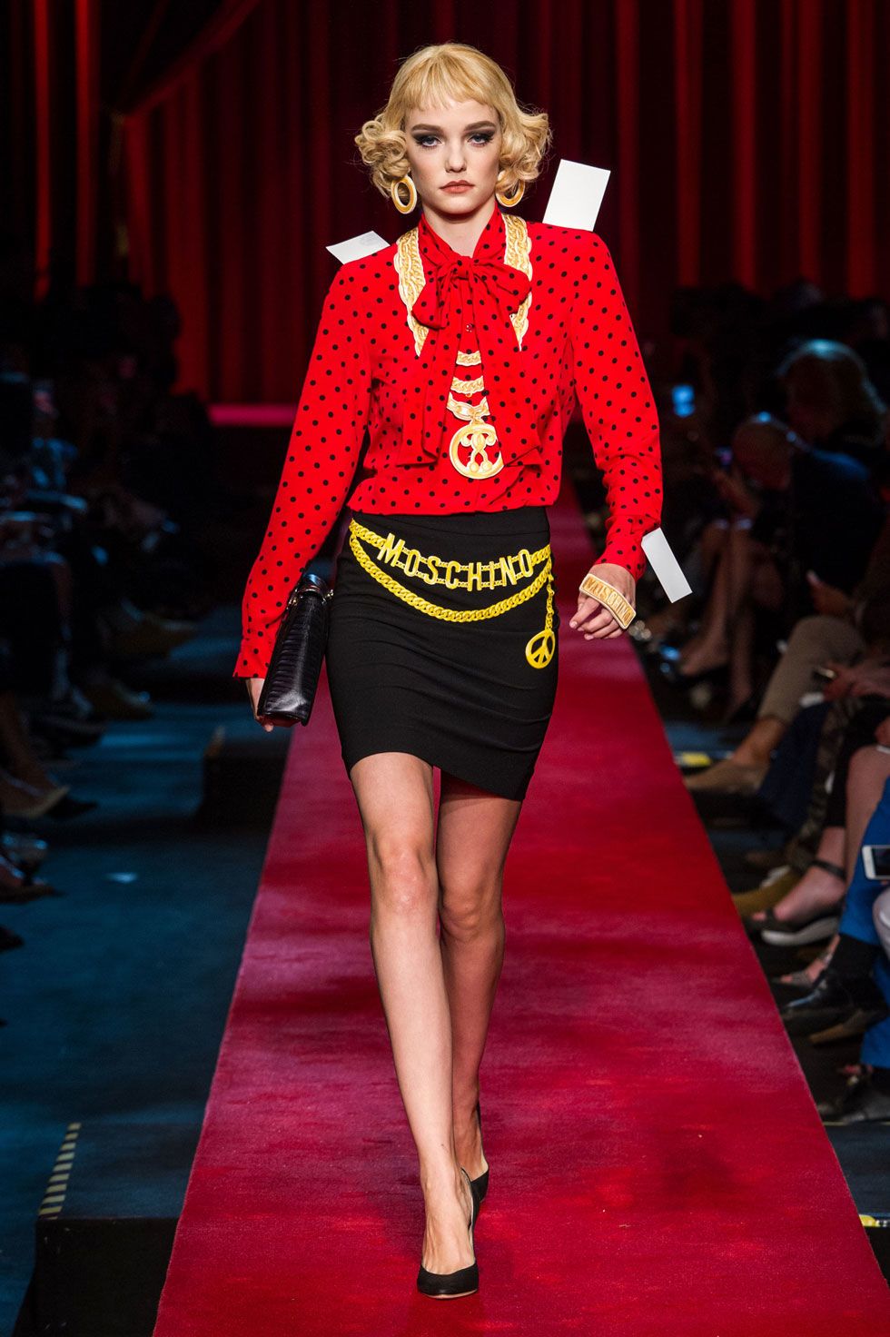 Fashion show, Red, Runway, Joint, Outerwear, Human leg, Fashion model, Style, Flooring, Jewellery, 
