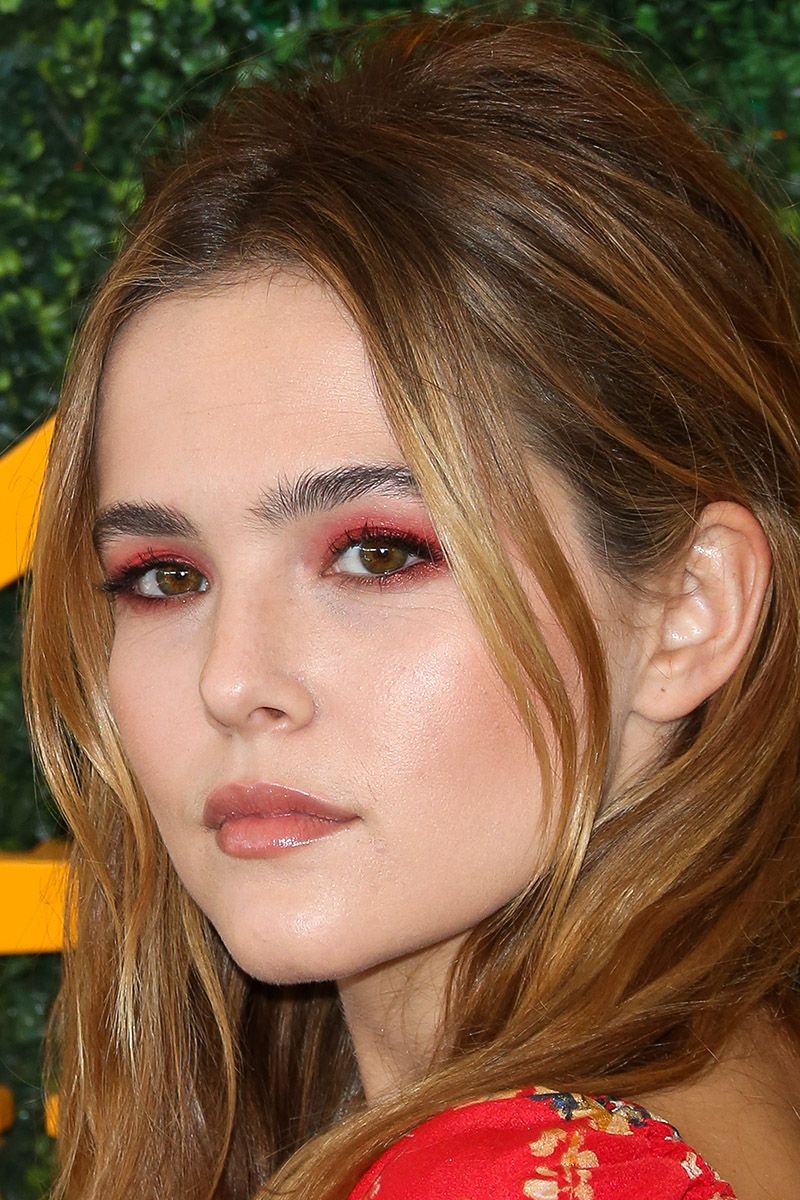 <p>Actress Zoey Deutch matches her red dress to her eyes, and singlehandedly shuts down any fears you had about wearing red eyeshadow.</p>