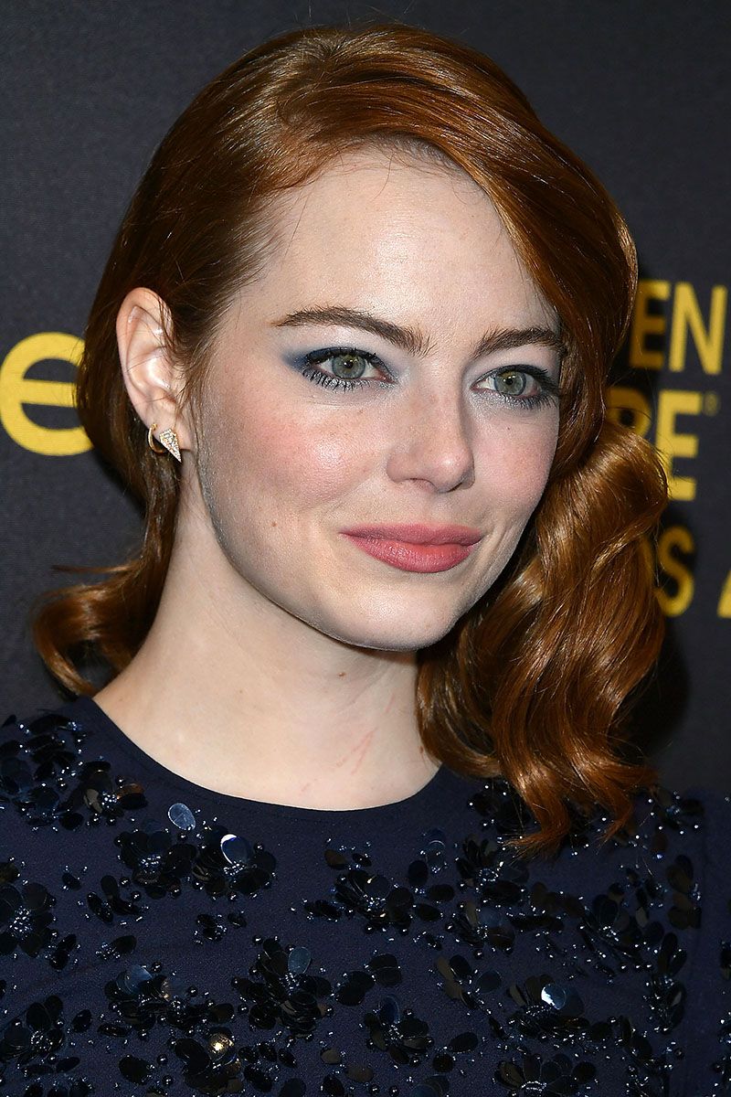 <p>There's nothing about this wash of powder blue eyeshadow that reads 1985. That's because Emma Stone kept the rest of her makeup raw and fresh.</p>