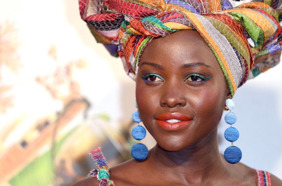 <p>Women with darker skin tones, like Lupita Nyong'o, can pull-off even the brightest and boldest makeup shades—even all at once.</p>