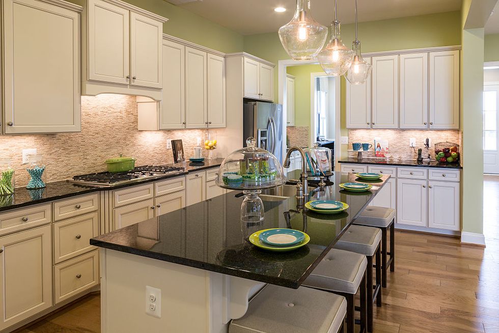Countertop, Cabinetry, Green, Room, Kitchen, Furniture, Property, Interior design, Yellow, Home, 