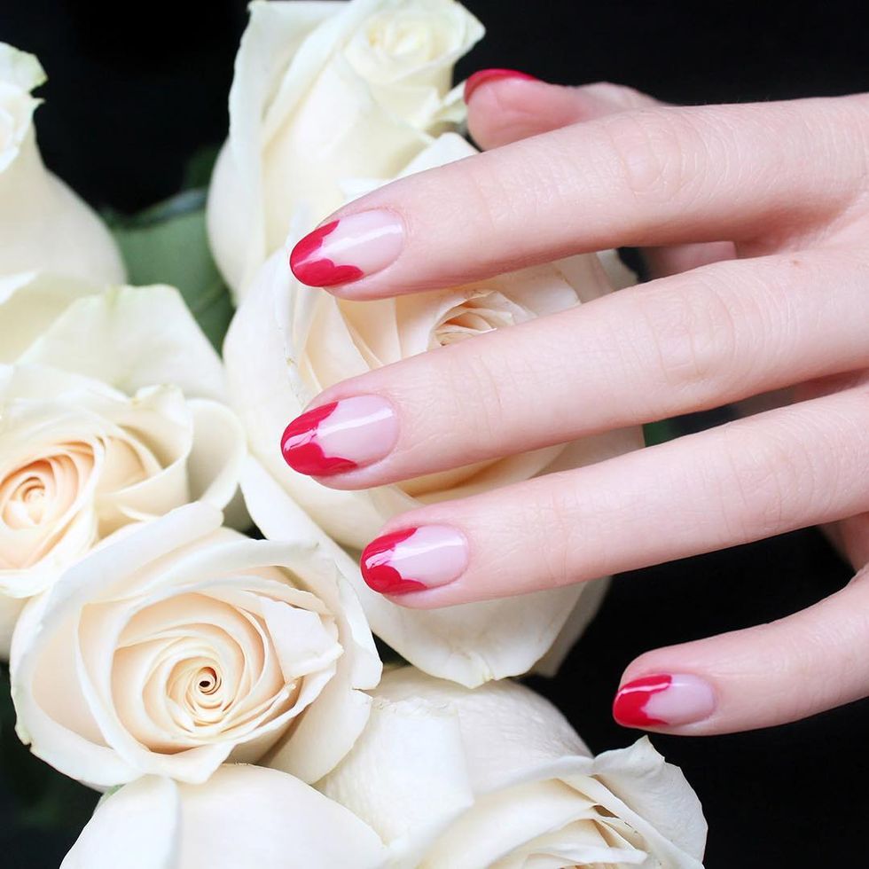 <p>Instead of painting a red French tip, scallop the inside edge for an abstract floral design.&nbsp;</p><p><em data-redactor-tag="em" data-verified="redactor">Design by&nbsp;<span class="redactor-invisible-space" data-verified="redactor" data-redactor-tag="span" data-redactor-class="redactor-invisible-space"></span></em><a href="https://www.instagram.com/p/BFKJJR4qRhK/"><em data-redactor-tag="em" data-verified="redactor">@jinsoon</em></a><br></p>