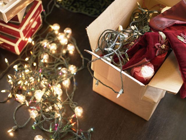 Christmas decoration, Present, Christmas, Gift wrapping, Interior design, Holiday, Christmas ornament, Ribbon, Silver, Christmas lights, 