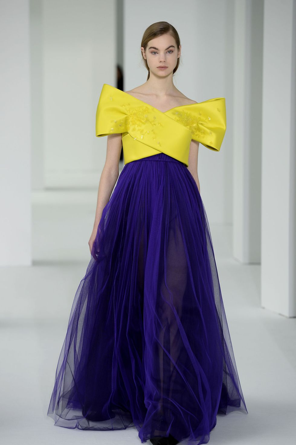 <p>You'll have your pick of poppy colors this year (your fave), but may we recommend a yellow? Or a marigold, maybe? Delpozo's got the right idea pairing a crossover bodice with a complementary violet.&nbsp;</p>