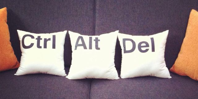 Pillow, Cushion, Throw pillow, Text, Furniture, Font, Linens, Textile, Couch, Bedding, 
