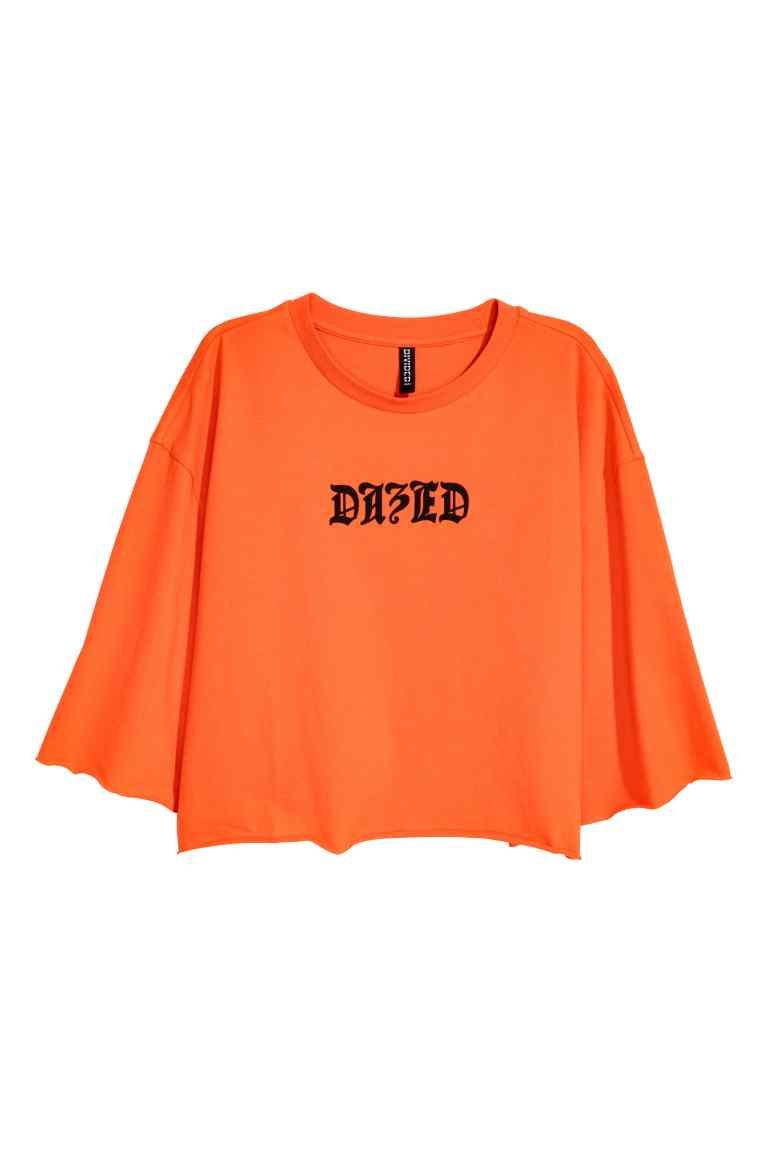 Clothing, Orange, Sleeve, Red, T-shirt, Crop top, Yellow, Blouse, Outerwear, Shirt, 