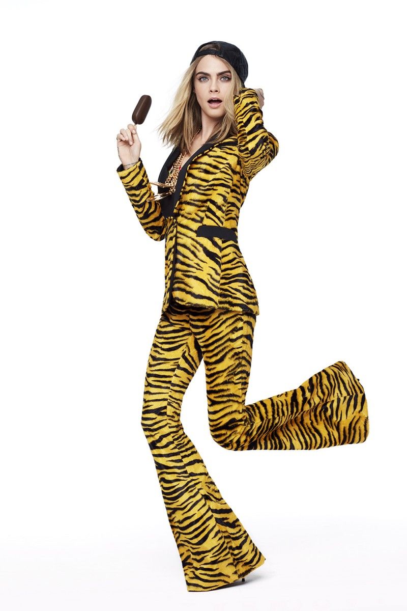 Clothing, Yellow, Costume, Sleeve, Trousers, Style, Gesture, Spandex, Leggings, 