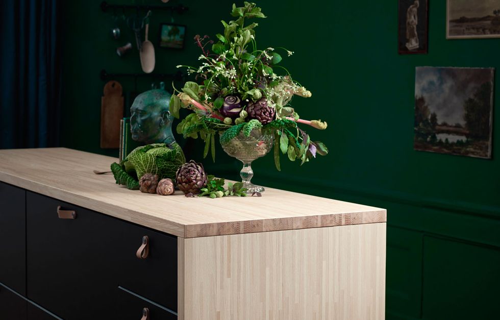 Green, Houseplant, Plant, Table, Room, Flower, Floral design, Furniture, Still life, Wood, 