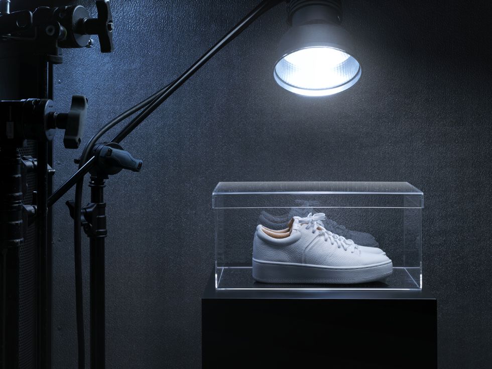 Footwear, Shoe, Lighting, Still life photography, Display case, Light fixture, Room, Photography, Still life, Space, 