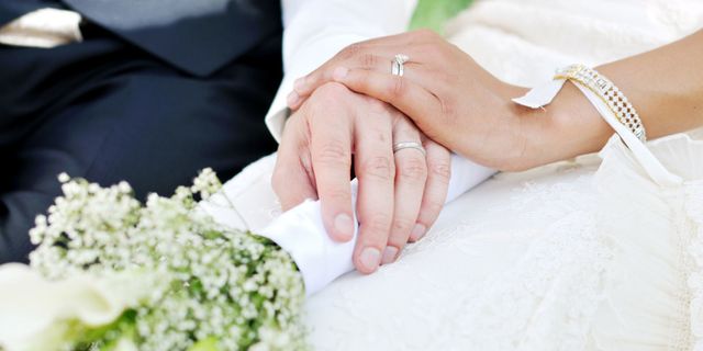 Hand, Wedding ring, Ring, Marriage, Wedding ceremony supply, Holding hands, Nail, Finger, Interaction, Gesture, 