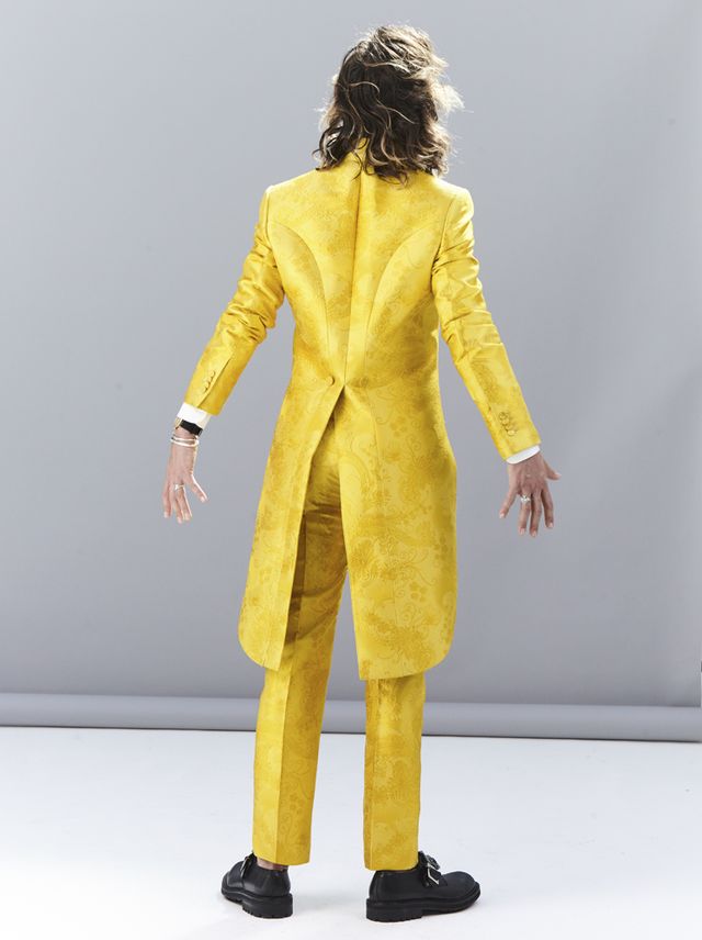 Yellow, Sleeve, Shoulder, Joint, Standing, Elbow, Suit trousers, Wrist, Toy, Waist, 