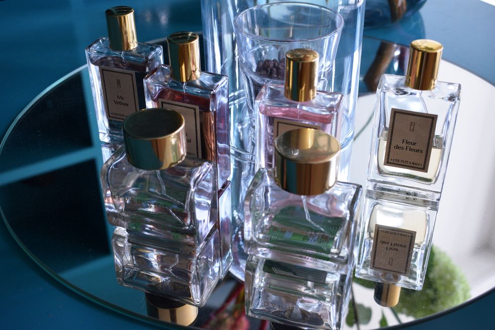 Fluid, Perfume, Liquid, Glass, Bottle, Transparent material, Cosmetics, Glass bottle, Silver, Still life photography, 