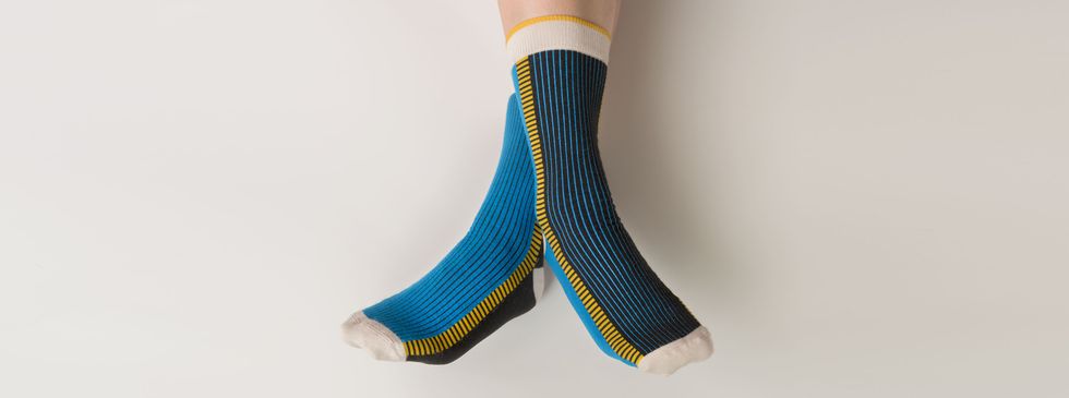 Sock, Blue, Yellow, Turquoise, Footwear, Ankle, Wool, Fashion accessory, Joint, Human leg, 
