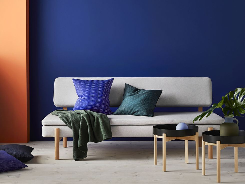 Blue, Furniture, Room, Interior design, Living room, Cobalt blue, Couch, Table, Wall, studio couch, 