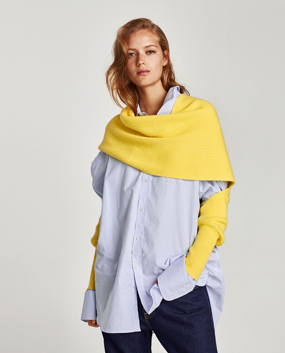 Clothing, Yellow, Shoulder, Outerwear, Fashion, Fashion model, Poncho, Neck, Joint, Sleeve, 