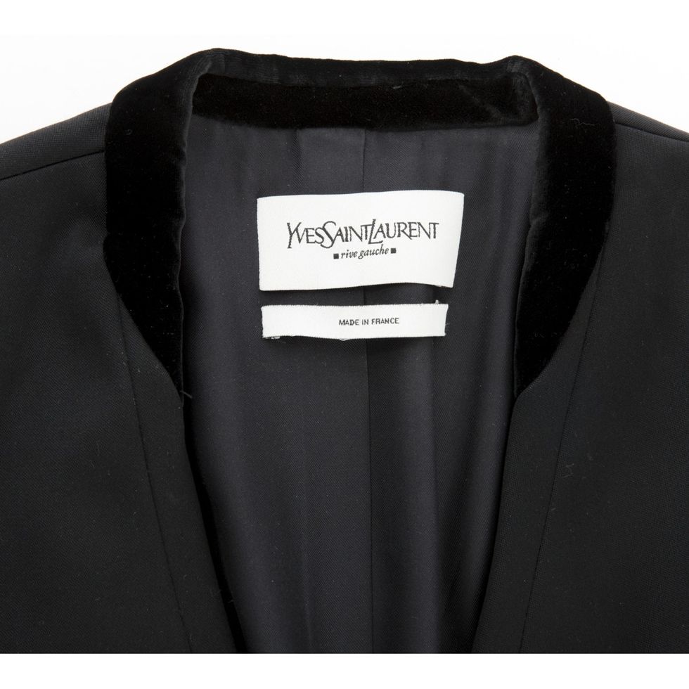 Clothing, Black, Suit, Outerwear, Formal wear, Button, Blazer, Jacket, Collar, Sleeve, 
